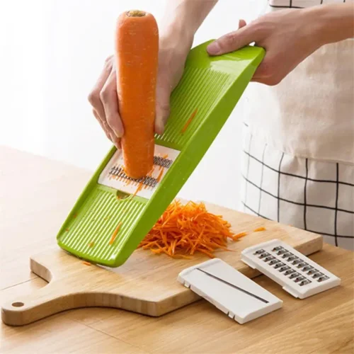 Vegetable grater cutting carrot